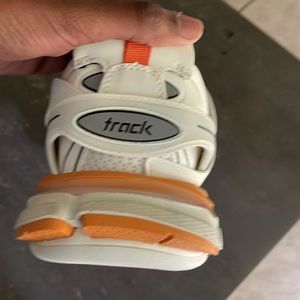Balenciaga tracks orange.  (Wore twice) (good condition)